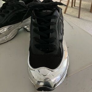 Raf Simons Black and Metallic Silver Sneakers